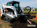 Фото Мини-погрузчик Bobcat T590 с траншеекопателем в аренду